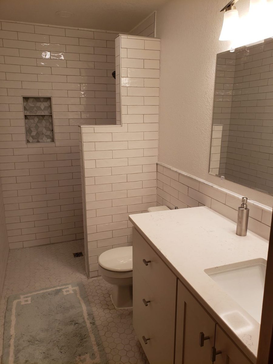 Photo of a fully remodeled upstairs bathroom.