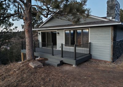 Photo of Trex Deck with black fortress railing.