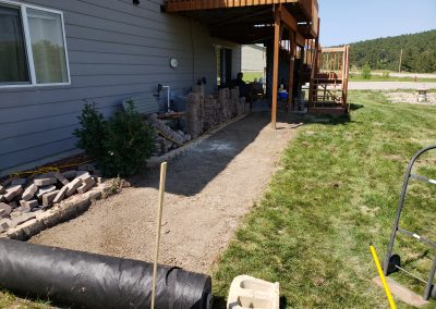 Photo of a patio block pathway under construction.
