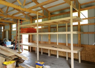 Photo of a heavy duty shelving and storage unit for a pole barn.