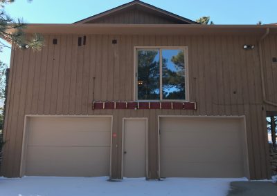 Photo of lap siding on a late 70's home after the deck was removed.