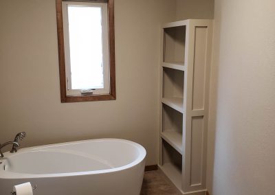 Photo of custom bathroom shelving.